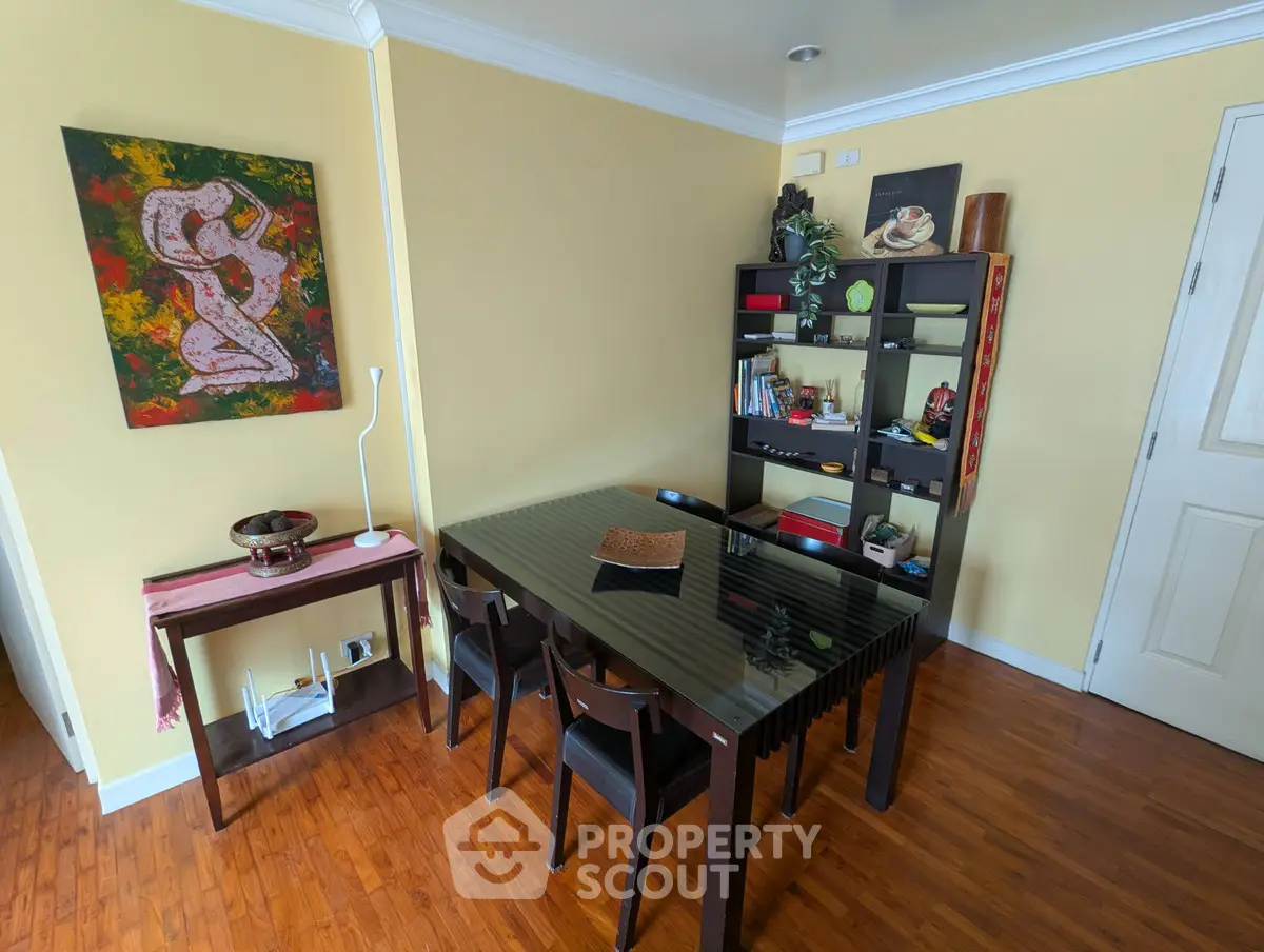 Charming dining area with elegant decor and wooden flooring