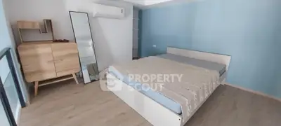Spacious modern bedroom with minimalist design and stylish furniture
