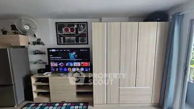 Modern living room with sleek wooden furniture and entertainment setup