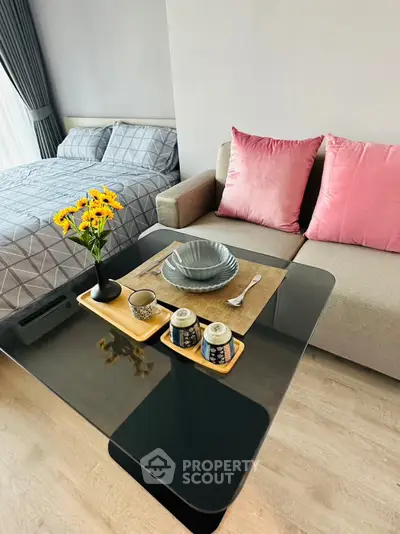 Stylish studio apartment with cozy living area and modern decor