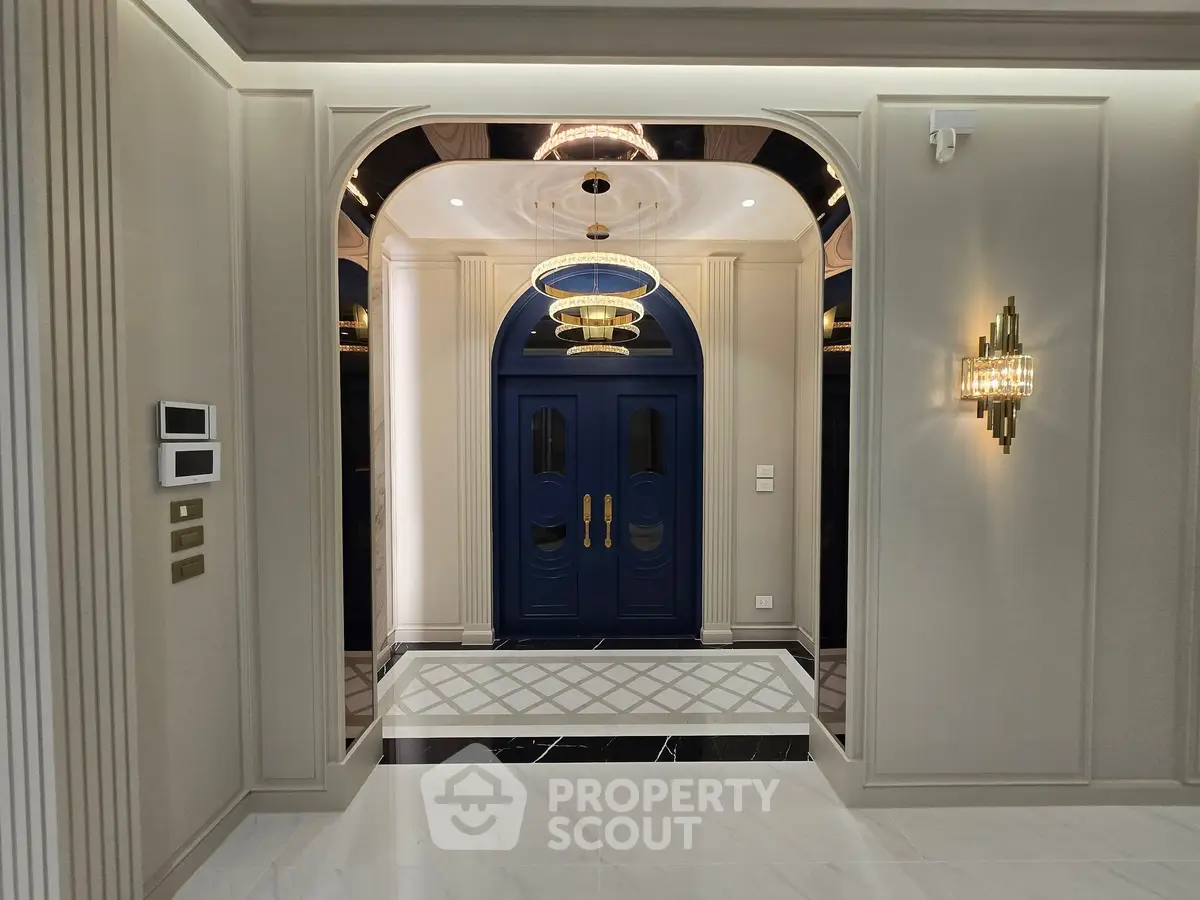 Luxurious entrance with elegant lighting and modern design