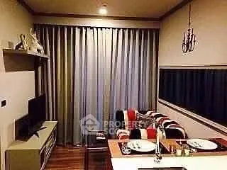Cozy living room with modern decor and stylish furniture, perfect for relaxation and entertainment.