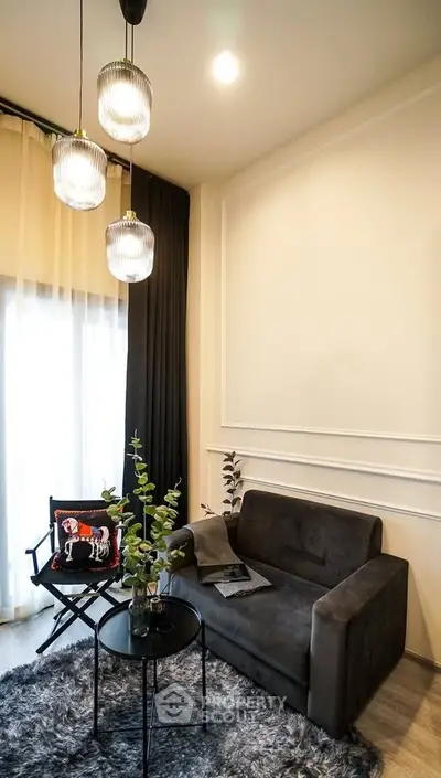 Stylish modern living room with plush sofa and chic lighting