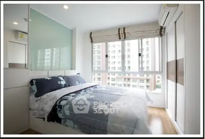 Bright and modern bedroom with large windows and stylish decor in a high-rise apartment.