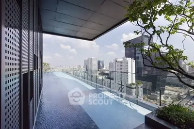 Stunning rooftop infinity pool with breathtaking city skyline view