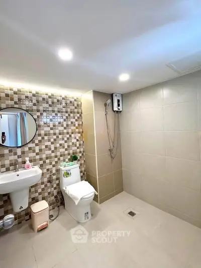 Modern bathroom with stylish tile design and sleek fixtures