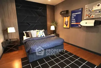 Stylish bedroom with modern decor and unique wall art, perfect for a cozy retreat.