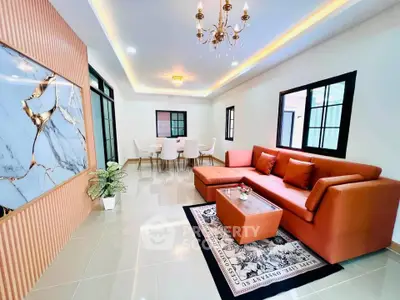 Luxurious modern living room with elegant decor and spacious dining area, featuring stylish furniture and ambient lighting.