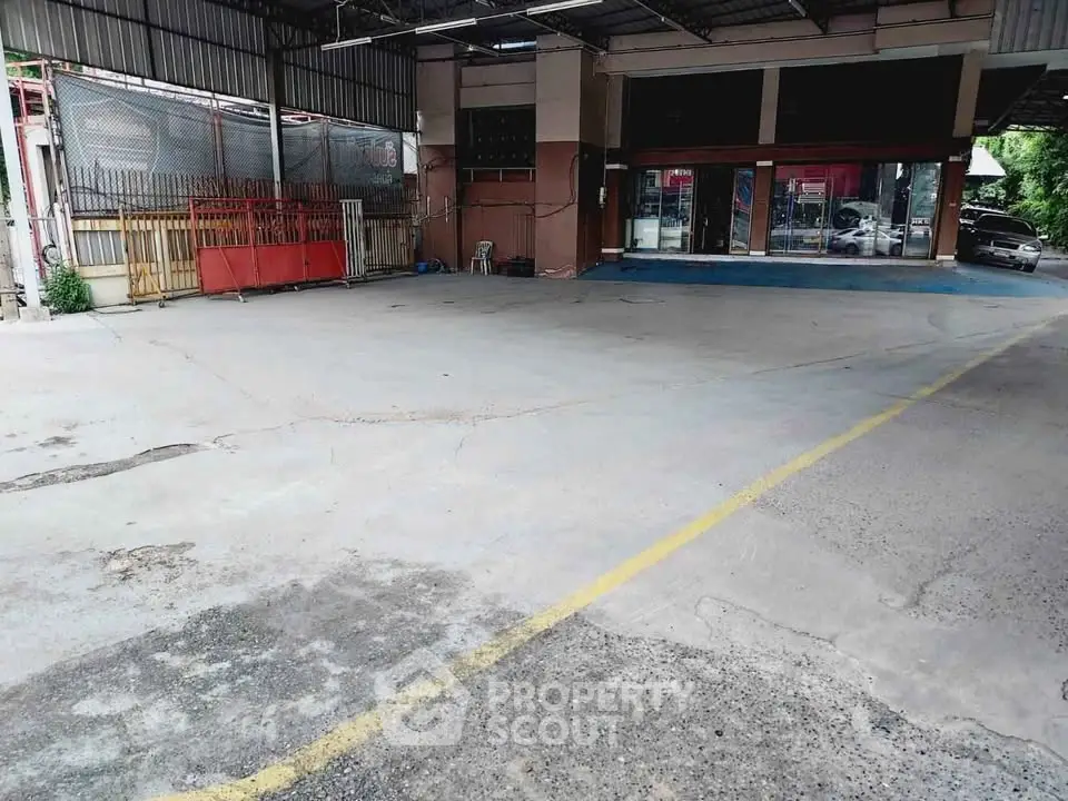 Spacious covered parking area with easy access and ample space for multiple vehicles.