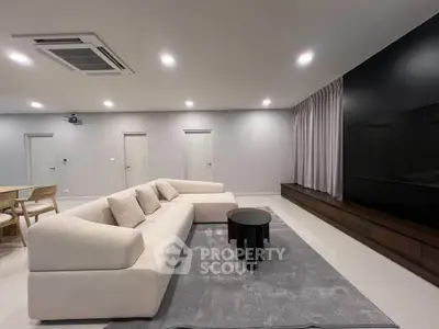 Spacious modern living room with sleek furniture and minimalist design