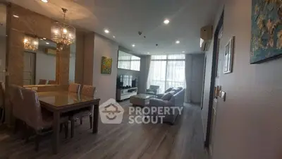 Spacious modern living room with elegant dining area and stylish decor