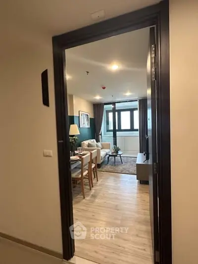 Modern living room with stylish decor and wooden flooring