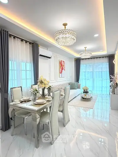 Luxurious modern living room with elegant dining area, marble flooring, and exquisite chandeliers.