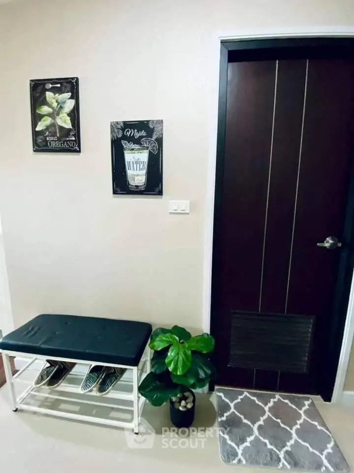 Charming entryway with stylish decor and shoe storage bench