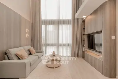 Luxurious modern living room with high ceilings and elegant decor