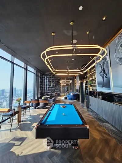 Luxurious high-rise apartment with stunning city views and modern interior design featuring a pool table.