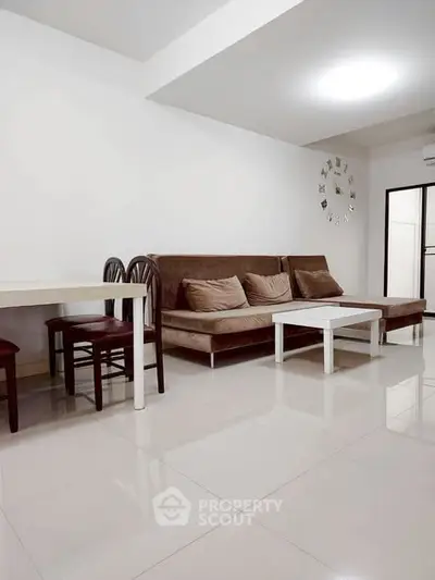 Modern living room with sleek furniture and minimalist decor