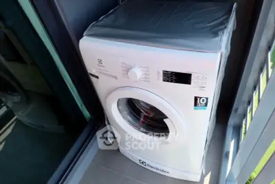 Modern washing machine on a balcony in a contemporary apartment