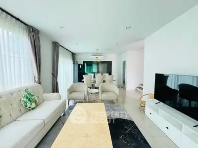 Spacious modern living room with elegant decor and natural light
