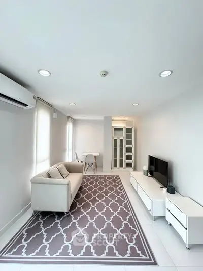 Modern living room with stylish decor and natural light