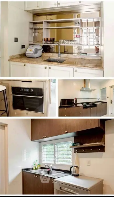 Modern kitchen with sleek appliances and stylish cabinetry, featuring an open layout and elegant countertops.