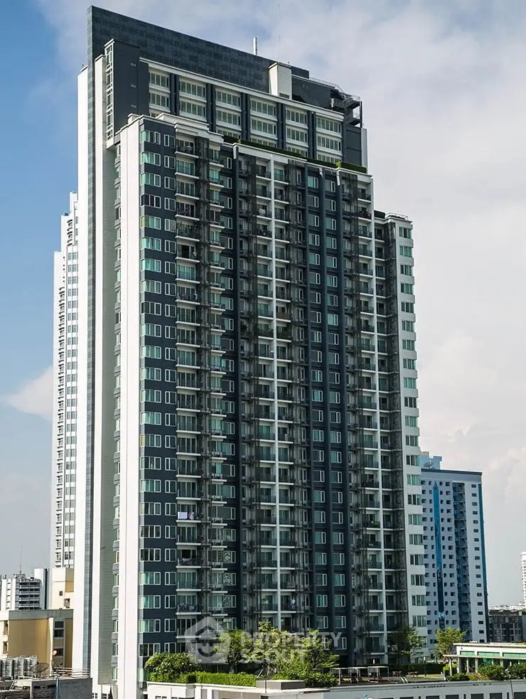 Stunning high-rise building with modern architecture and expansive city views.
