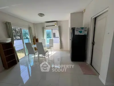 Bright and airy living room with modern furniture and large windows