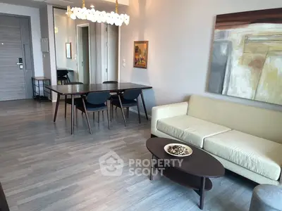 Modern living room with elegant dining area and contemporary decor
