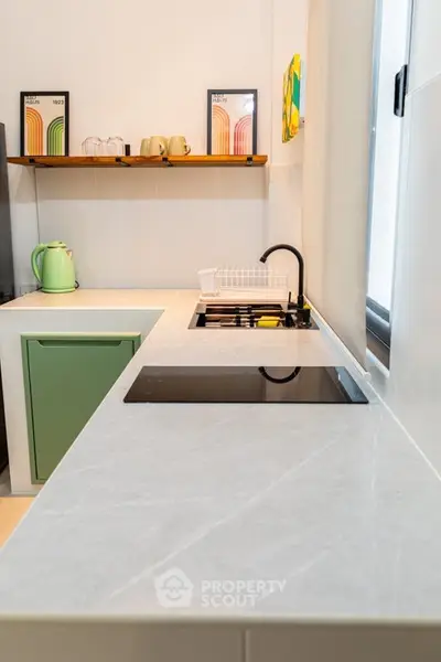 Modern kitchen with sleek countertops and stylish decor