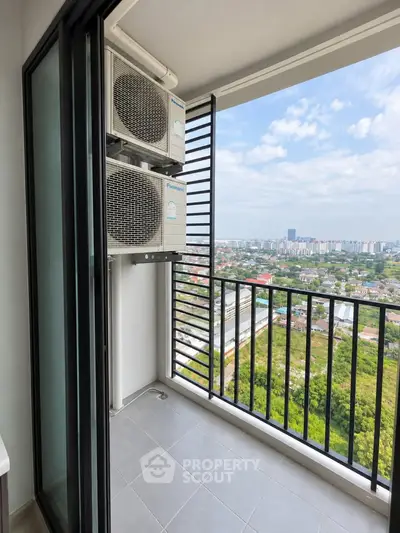 Modern balcony with city view and air conditioning units, perfect for urban living.