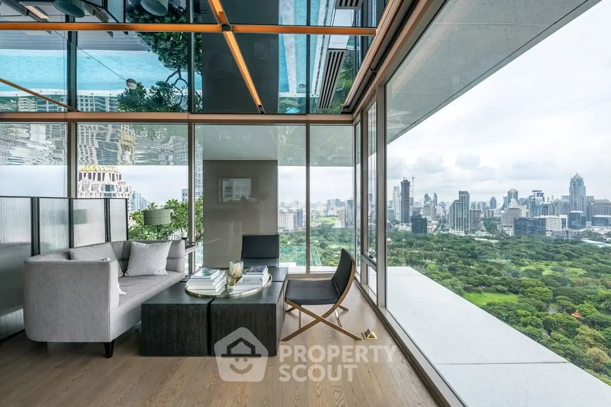 Luxurious high-rise living room with panoramic city and park views, featuring modern decor and floor-to-ceiling windows.