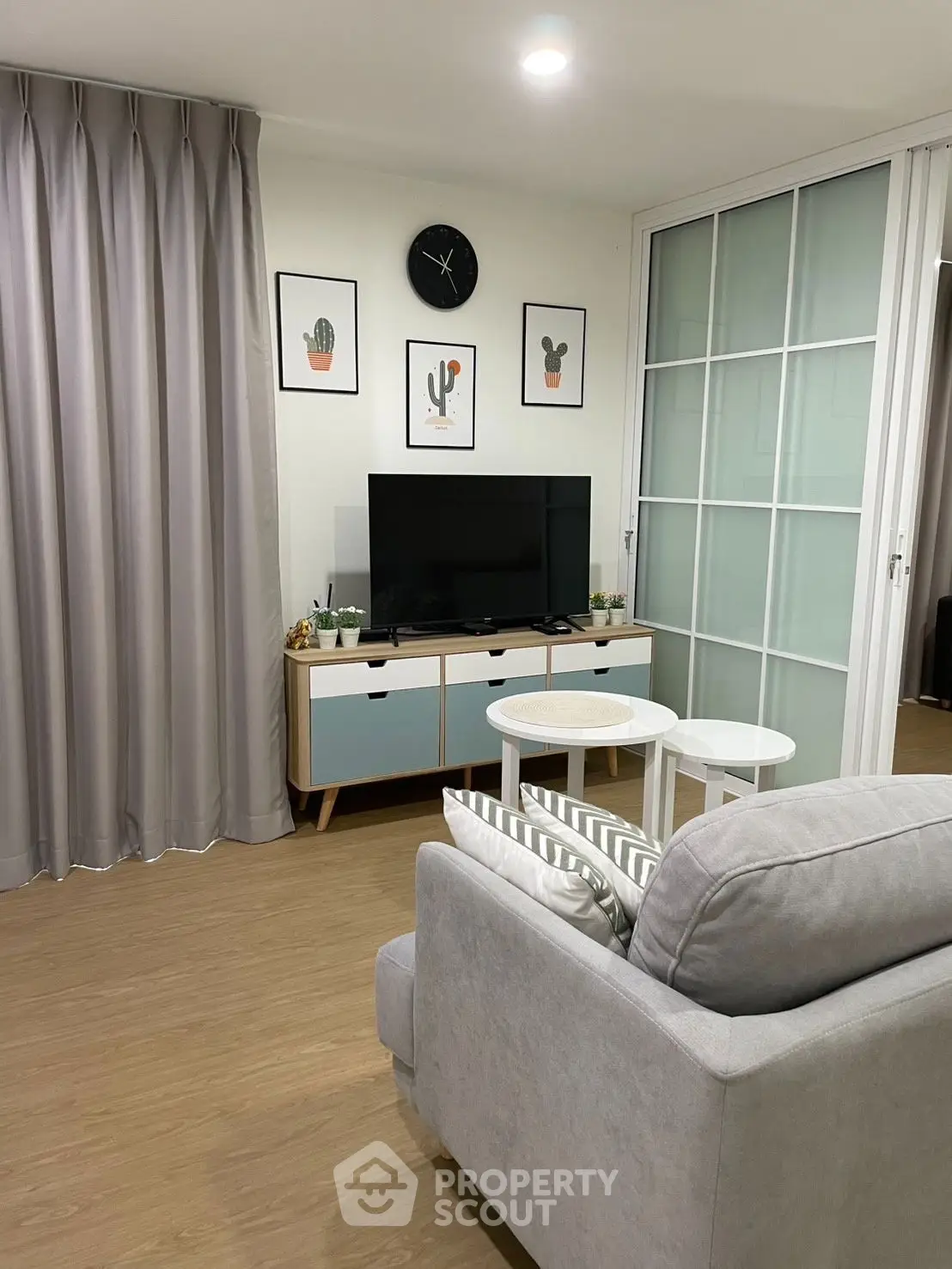 Modern living room with stylish decor and cozy seating area.