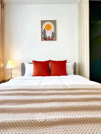 Modern bedroom with stylish decor and cozy ambiance