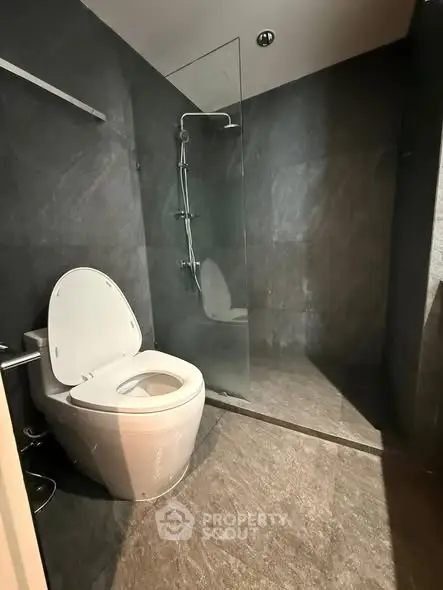 Modern bathroom with sleek design and glass shower enclosure