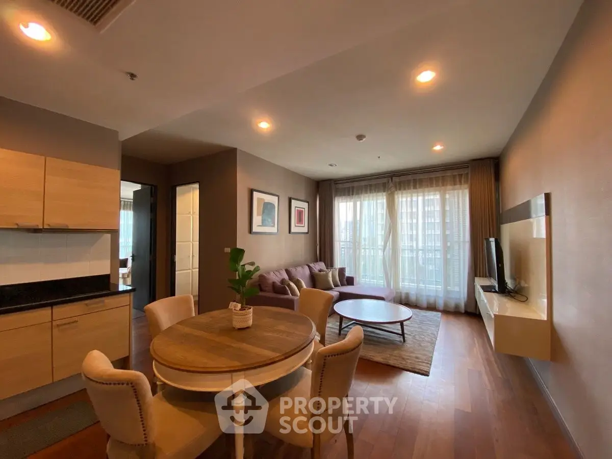 Spacious living room with elegant dining area and modern decor