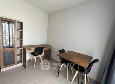 Modern study room with sleek furniture and ample natural light