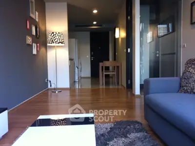 Modern living room with stylish decor and open layout in a contemporary apartment.