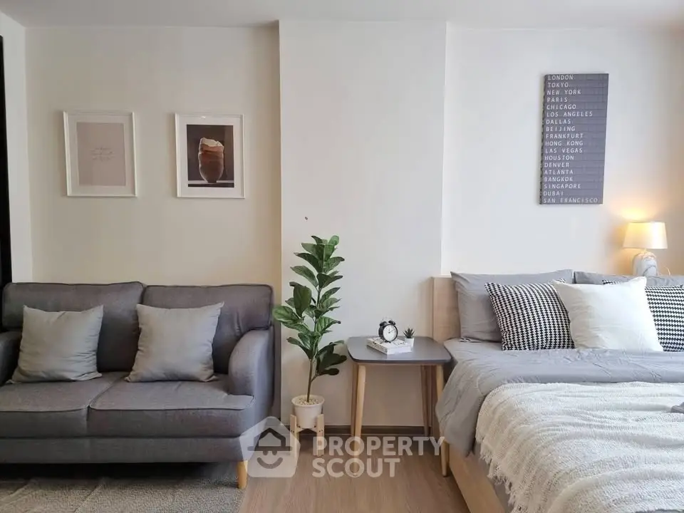 Modern studio apartment with cozy living area and stylish decor