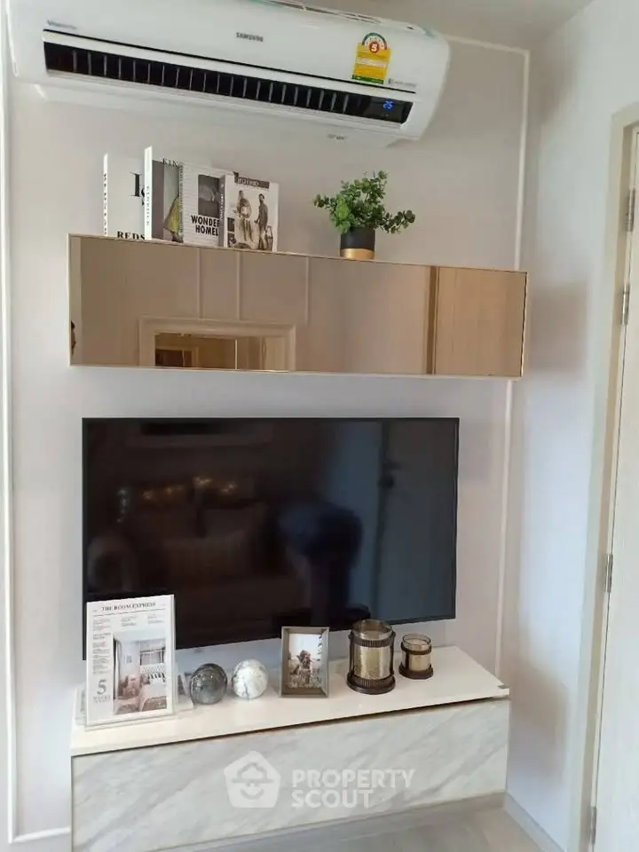 Modern living room with sleek TV setup and stylish decor