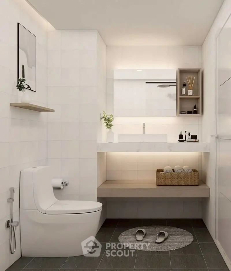 Modern bathroom with sleek design, featuring a wall-mounted toilet and stylish shelving.