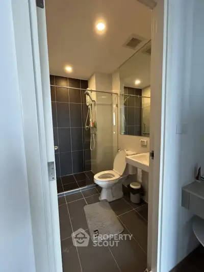 Modern bathroom with sleek design and glass shower enclosure