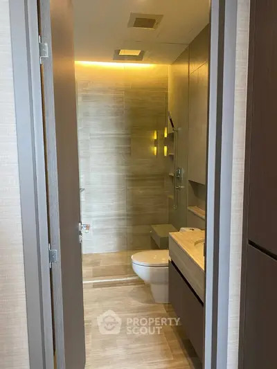 Modern bathroom with sleek design and ambient lighting