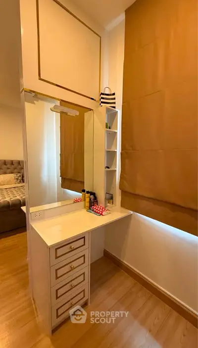 Elegant bedroom with stylish vanity and cozy decor