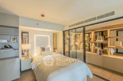 Luxurious bedroom with modern decor and ample storage space