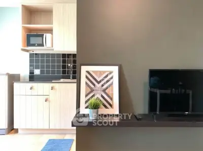 Modern apartment interior with stylish kitchen and cozy living area