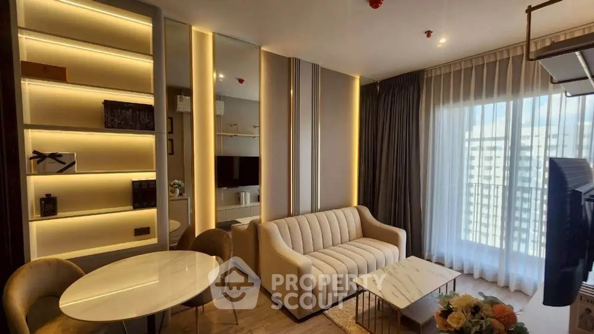 Modern living room with elegant lighting and stylish furniture