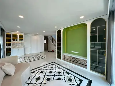 Spacious modern living room with elegant design and unique floor patterns
