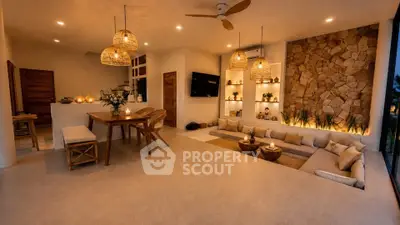 Luxurious open-plan living room with cozy seating and ambient lighting