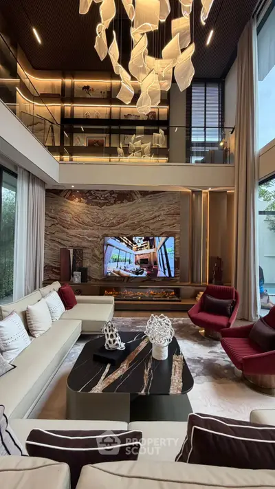 Luxurious modern living room with high ceilings and elegant decor