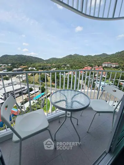 Charming balcony with stunning mountain views, perfect for relaxation and enjoying the scenery.